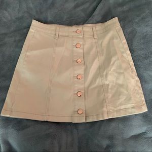 Beige button up front mini skirt